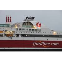 The characteristic, red painted, gas vent lines, featuring “Powered by LNG” on top of the vessel.