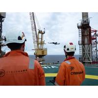 Cyberhawk team operating drones offshore Photo Cyberhawk