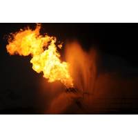 Gas from the damaged Deepwater Horizon wellhead is burned by the drillship Discoverer Enterprise in May 2010, in a process known as flaring. (U.S. Coast Guard photo by Patrick Kelley)