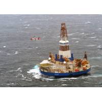 Drill barge Kulluk, used for oil exploration in the Arctic, drifted aground December 31, 2012. (U.S. Coast Guard photo by Jonathan Klingenberg)