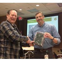 Fairweather Safety Manager Gordon Randall (left) accepts the BP Cole Griggs Safety Award on behalf of the tool service team from Greg Mattson, Regional Vice President of BP Alaska Global Wells. Randall has served as the project manager for Fairweather BP Tool Service for over 16 years and is recognized as an expert in the field. (Photo: Fairweather)