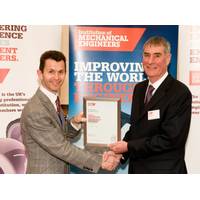 Mark Hunt, President of IMechE presenting EnerMech’s Phil Bentley with his Fellowship accreditation (Photo: EnerMech)