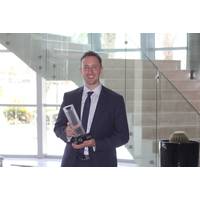 Robbie Pond with the award Photo TWMA