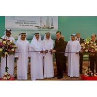 HE Sheikh Saud Bin Khalid Al Qasimi (center) cuts the ribbon for the NDC Shuwehat rig alongside Lamprell CEO Jim Moffat (right) and NDC Chief Executive Officer Abdalla Saeed Al Suwaidi (left)