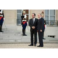 Vladimir Putin with Francois Hollande (Photo courtesy Putin's personal website)