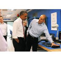 Rod Washington, Sr. Development Engineer, Vacon Inc. demonstrates AC drive energy efficiency principles to President Obama. Behind (left), Dan Isaksson, Vice President, Medium Voltage Drives, Vacon, and Dr. Ernest Moniz, United States Secretary of Energy.