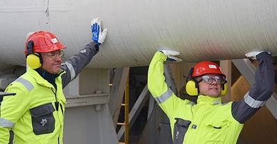 A lot of gas to carry. EEA and EU affairs minister, Vidar Helgesen (right), with senior vice president for operations west, at the Troll A platform’s gas export pipeline. (Photo: Statoil)