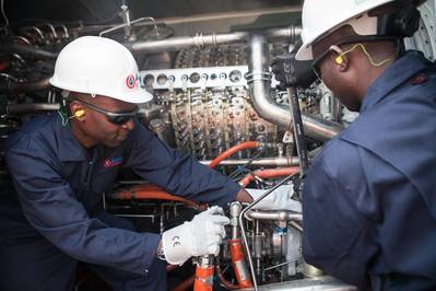 APR Energy operators doing routine maintenance on one of APR's mobile gas turbine generators at Rocha Pinto, Angola. Photo APR Energy
