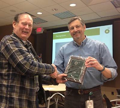 Fairweather Safety Manager Gordon Randall (left) accepts the BP Cole Griggs Safety Award on behalf of the tool service team from Greg Mattson, Regional Vice President of BP Alaska Global Wells. Randall has served as the project manager for Fairweather BP Tool Service for over 16 years and is recognized as an expert in the field. (Photo: Fairweather)