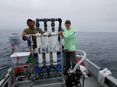 Dr. John Kessler (right) and Dr. DongJoo Joung (Pusan National University) collecting methane for radiocarbon analysis. All images: University of Rochester/John Kessler