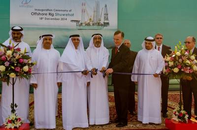 HE Sheikh Saud Bin Khalid Al Qasimi (center) cuts the ribbon for the NDC Shuwehat rig alongside Lamprell CEO Jim Moffat (right) and NDC Chief Executive Officer Abdalla Saeed Al Suwaidi (left)