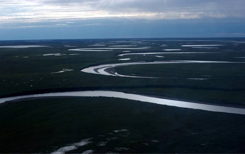 Fish Creek wanders through the National Petroleum Reserve-Alaska, a 22.8 million acre region managed by the Bureau of Land Management on Alaska's North Slope. USGS has periodically assessed oil and gas resource potential there. These assessments can be found here. (Credit: David Houseknecht, USGS.)