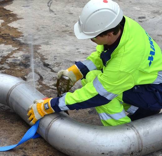 A high pressure leak being closed with a Miko Pipe Sealer kit (Photo: Miko)